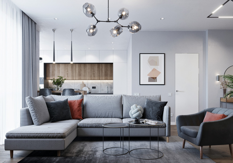 На фото: открытая, объединенная гостиная комната среднего размера в современном стиле с серыми стенами, полом из ламината, телевизором на стене и коричневым полом с