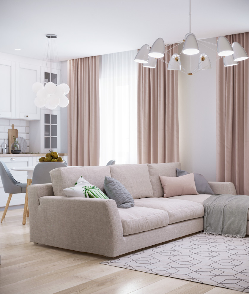 Esempio di un soggiorno scandinavo di medie dimensioni e aperto con pareti bianche, pavimento in laminato, TV a parete e pavimento beige