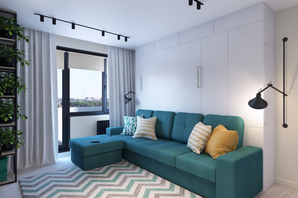 На фото: гостиная комната в современном стиле с разноцветными стенами, телевизором на стене и бежевым полом с