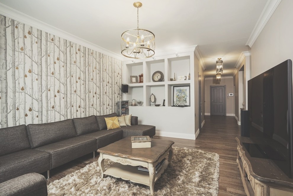 Transitional formal and enclosed brown floor living room photo in Other with gray walls and a tv stand