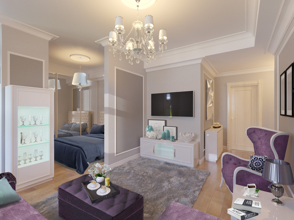 На фото: маленькая открытая гостиная комната в стиле модернизм с серыми стенами, паркетным полом среднего тона и телевизором на стене для на участке и в саду с
