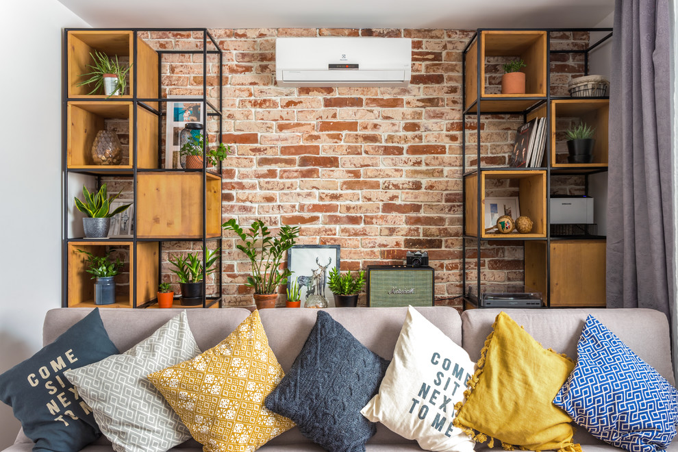 На фото: открытая, парадная гостиная комната среднего размера в скандинавском стиле с телевизором на стене и коричневыми стенами