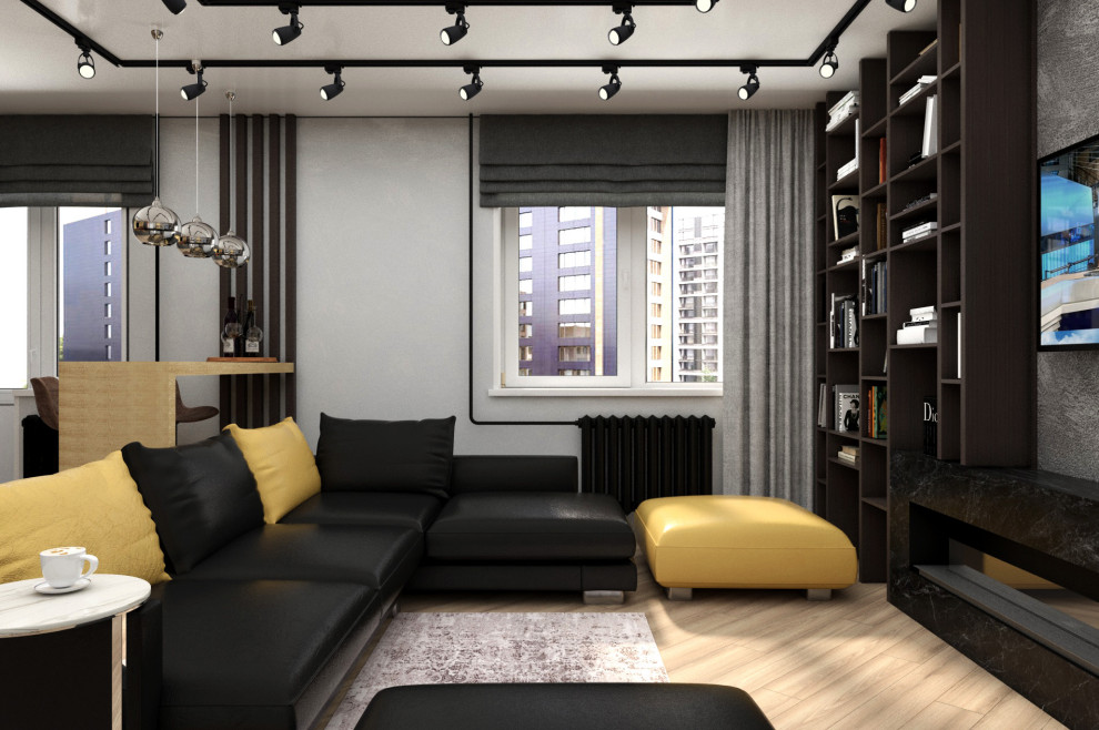 Idee per un soggiorno industriale di medie dimensioni con pareti grigie, pavimento in laminato, camino lineare Ribbon, TV a parete e pavimento beige
