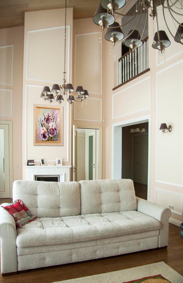 Large transitional loft-style medium tone wood floor and beige floor living room library photo in Moscow with beige walls, a ribbon fireplace, a wood fireplace surround and a media wall