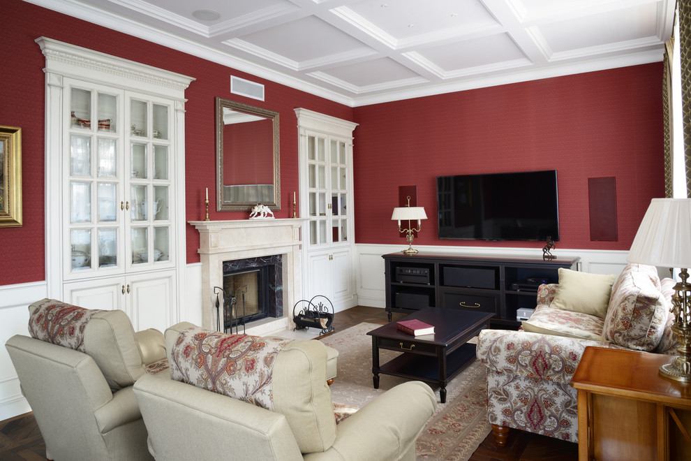 Exemple d'un salon chic ouvert avec une salle de réception, un mur rouge, une cheminée standard, un manteau de cheminée en pierre et un téléviseur fixé au mur.