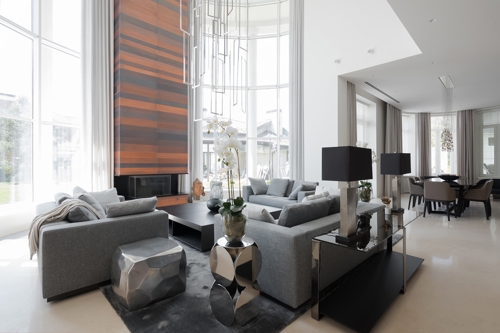 Ispirazione per un soggiorno design aperto con sala formale, pareti bianche e pavimento beige