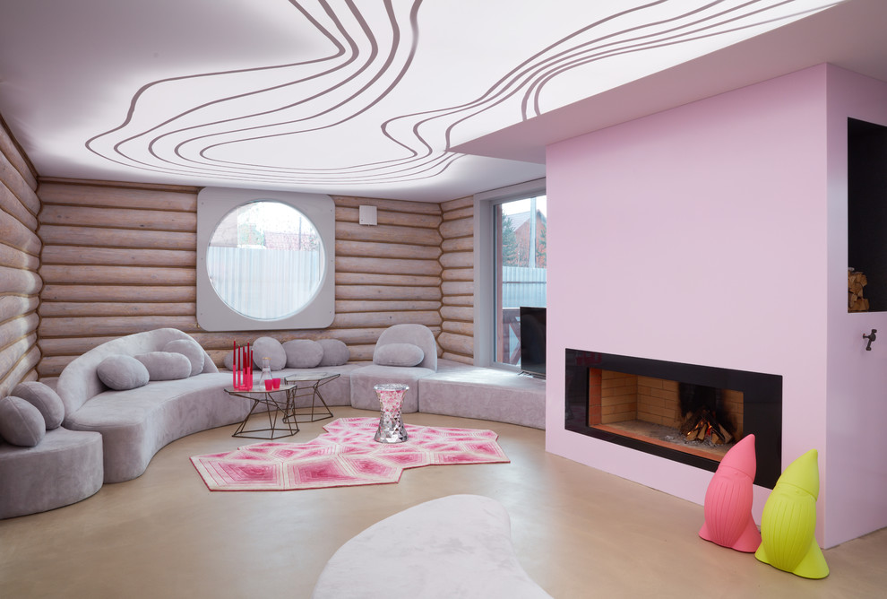 Imagen de salón abierto actual con todas las chimeneas, suelo beige, paredes rosas y marco de chimenea de metal
