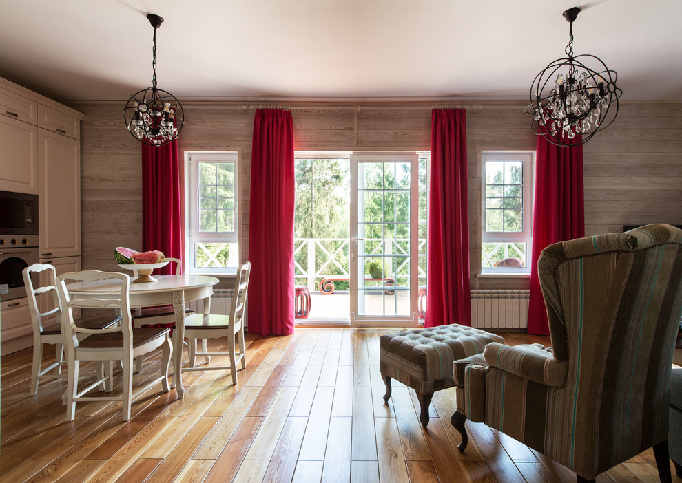 Esempio di un grande soggiorno classico aperto con sala formale, pareti beige e pavimento in legno massello medio
