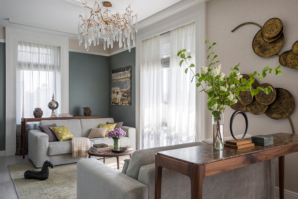 Esempio di un soggiorno contemporaneo con pareti beige e pavimento grigio