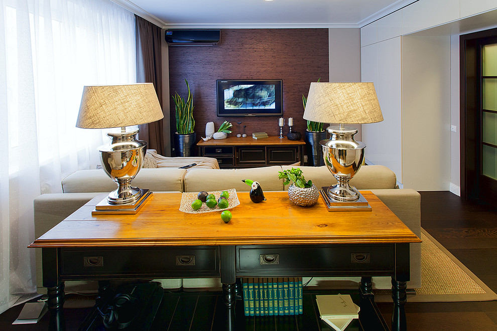 This is an example of a contemporary living room in Moscow with dark hardwood flooring.