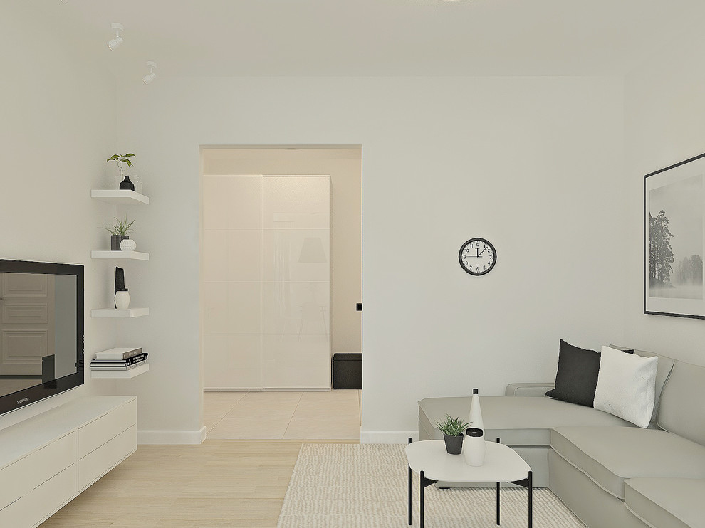 This is an example of a small scandinavian open plan living room in Other with white walls, laminate floors, a wall mounted tv and beige floors.