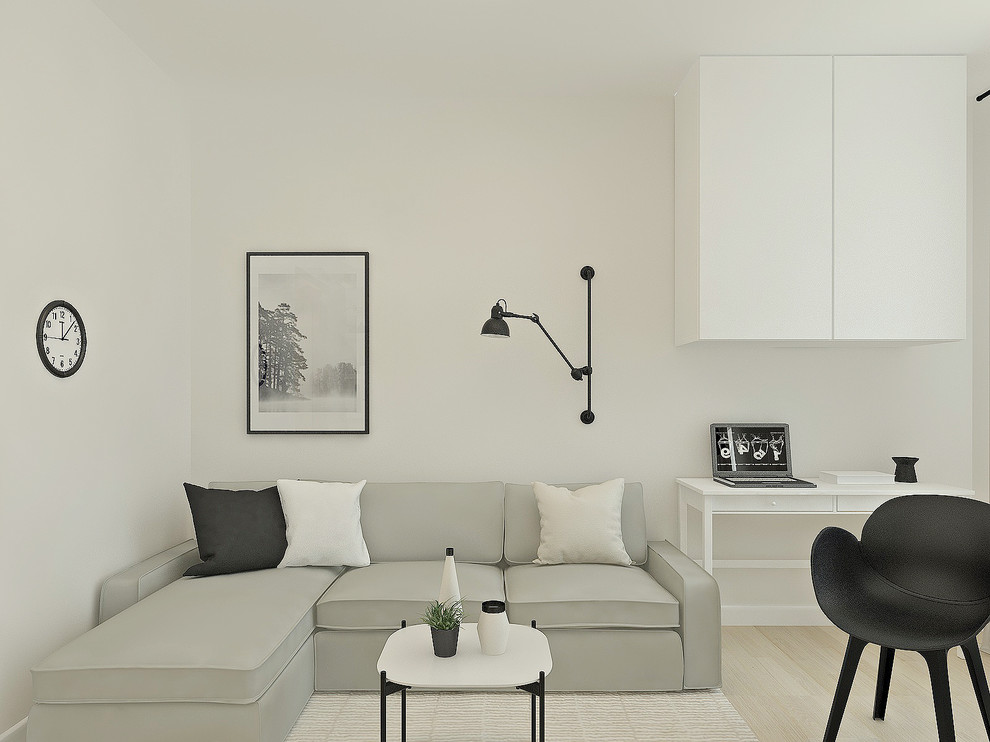 Small scandinavian open plan living room in Other with white walls, laminate floors, a wall mounted tv and beige floors.