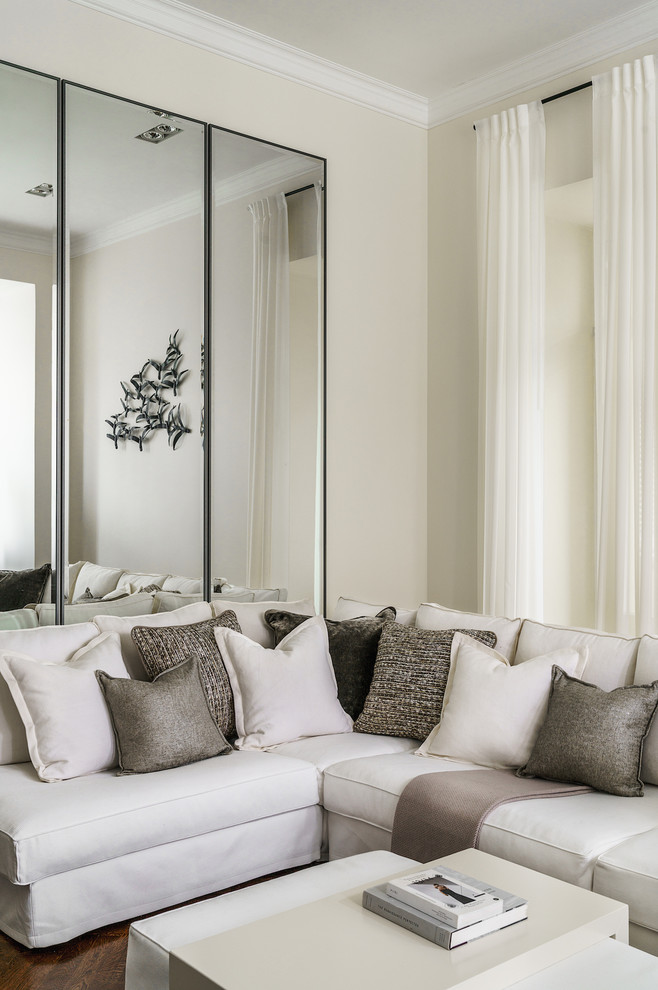 Foto di un soggiorno minimal con pareti beige