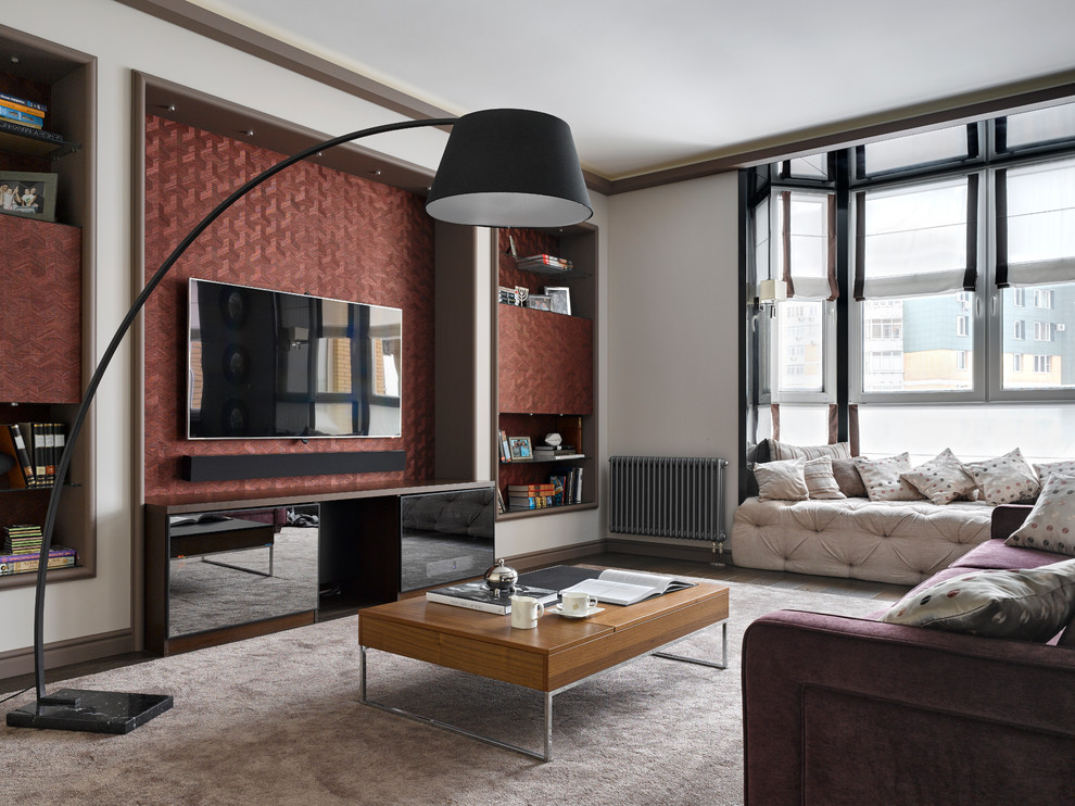 Immagine di un soggiorno minimal con pareti bianche, moquette e TV a parete