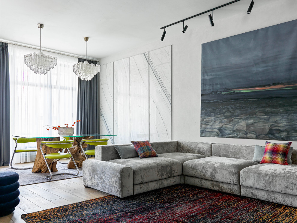 Foto di un soggiorno minimal con pareti grigie