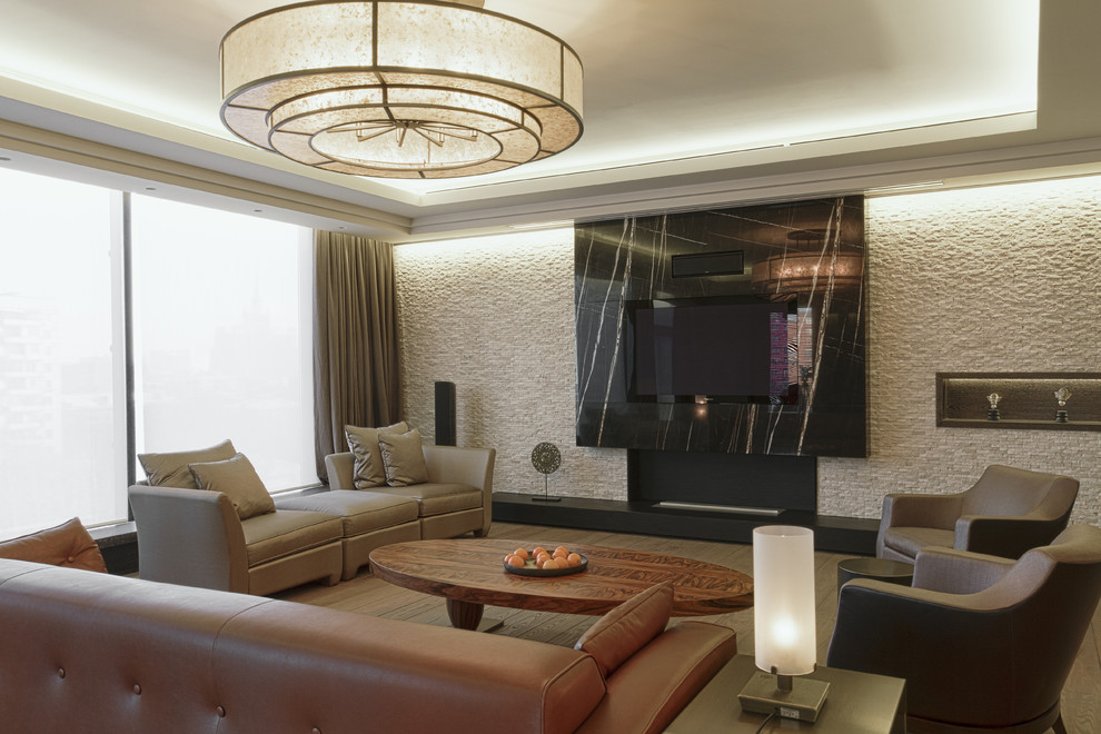 Foto di un soggiorno design aperto con sala formale, pareti grigie, camino lineare Ribbon e TV a parete