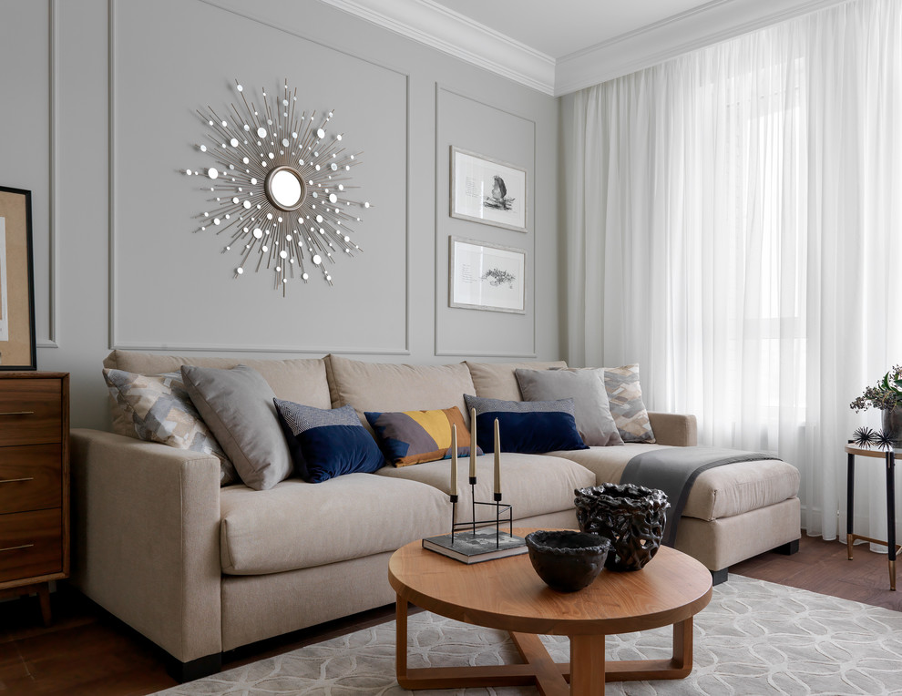 Стильный дизайн: гостиная комната среднего размера в современном стиле с серыми стенами - последний тренд