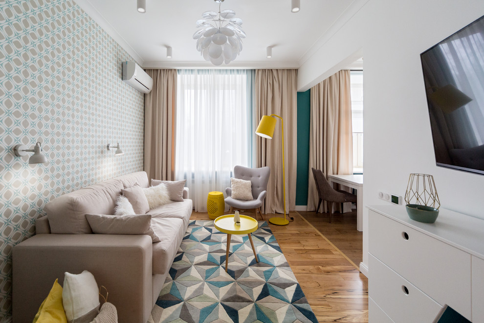 Scandinavian formal open plan living room in Moscow with medium hardwood flooring and a wall mounted tv.