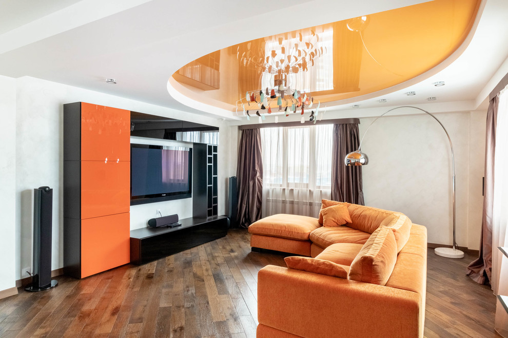 Contemporary enclosed living room in Other with white walls, medium hardwood flooring, a wall mounted tv, brown floors and feature lighting.