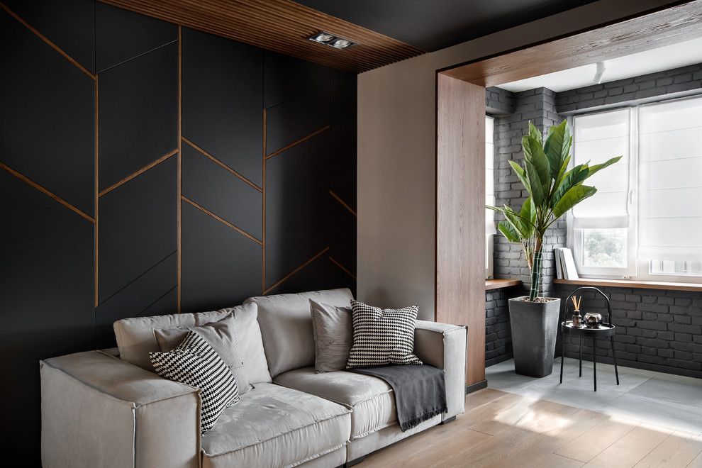 Inspiration för ett mellanstort funkis vardagsrum, med vita väggar, mellanmörkt trägolv och en väggmonterad TV