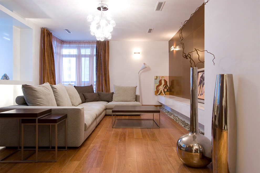Contemporary open plan living room in Moscow with white walls.