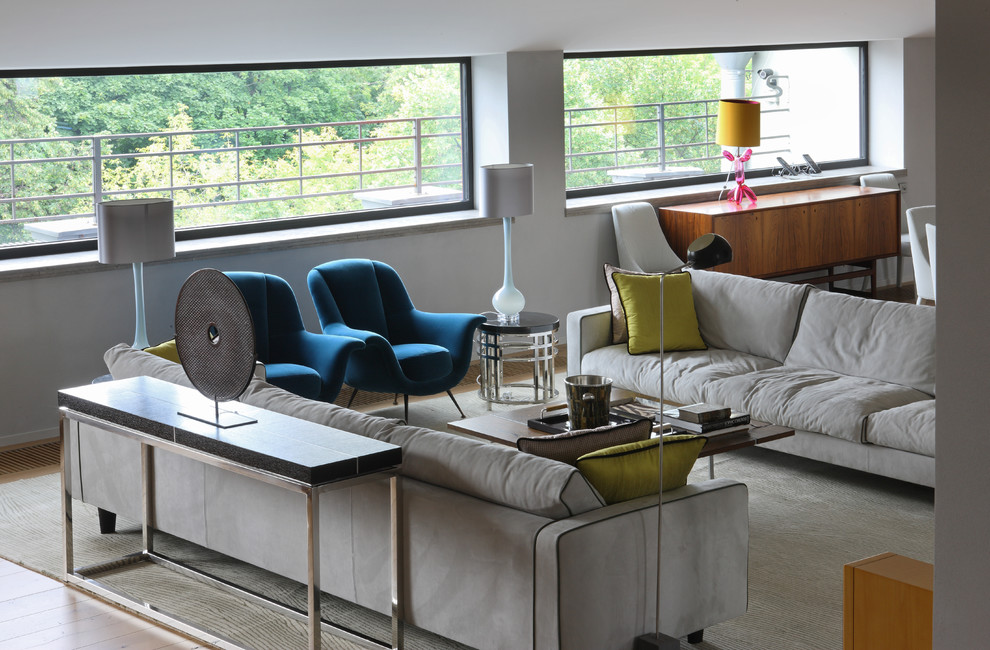 Foto di un ampio soggiorno design con sala formale, pareti grigie e moquette