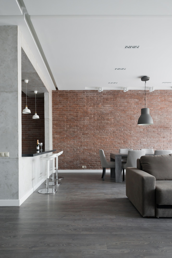 Свежая идея для дизайна: объединенная гостиная комната в стиле лофт - отличное фото интерьера