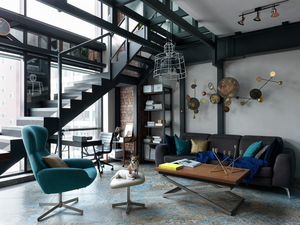 This is an example of an industrial living room in Moscow with grey walls and multi-coloured floors.