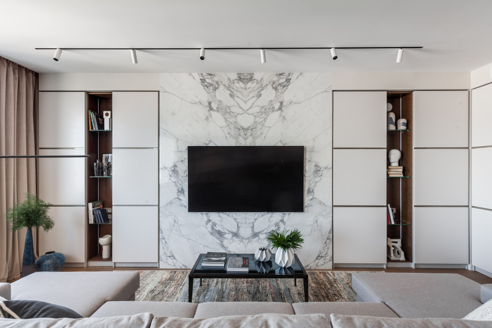 Inspiration for a contemporary brown floor living room remodel in Moscow with white walls and a wall-mounted tv