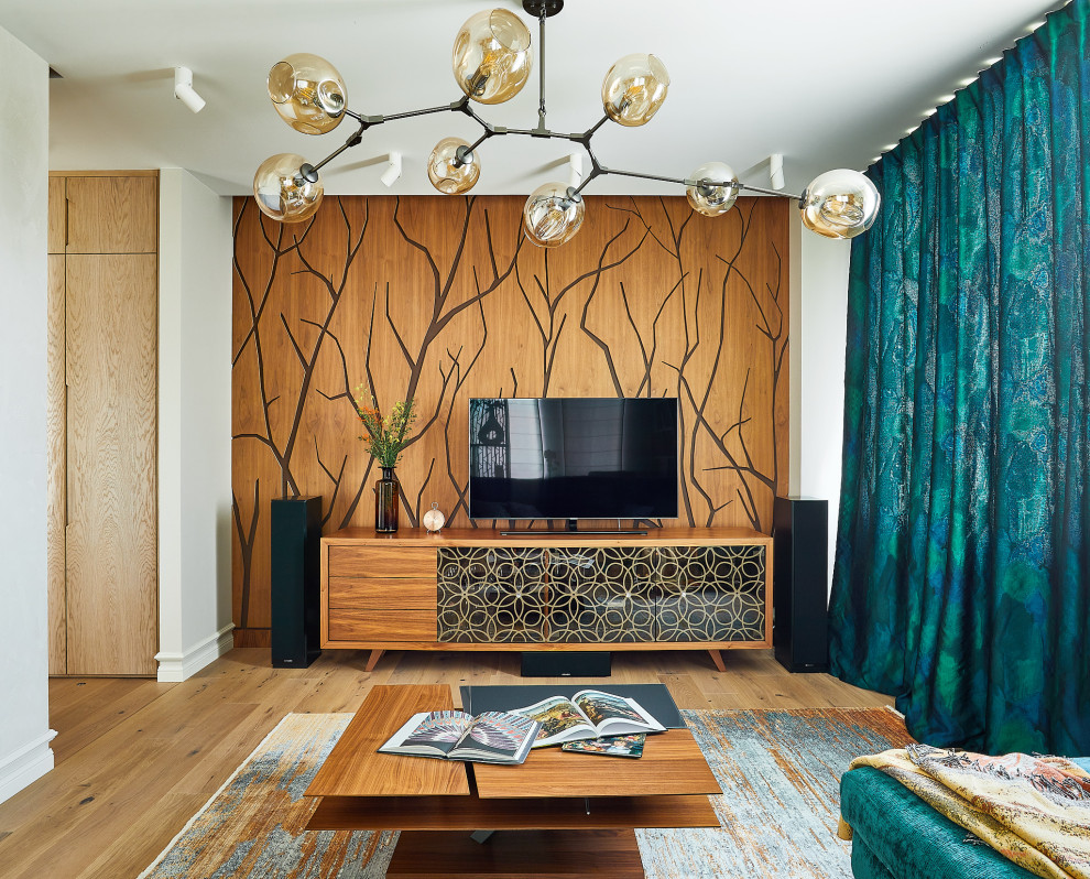 This is an example of a medium sized eclectic enclosed living room in Moscow with a reading nook, beige walls, medium hardwood flooring, a wall mounted tv, beige floors and panelled walls.