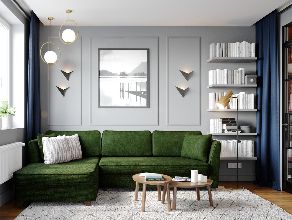 Пример оригинального дизайна: изолированная гостиная комната среднего размера в современном стиле с серыми стенами, паркетным полом среднего тона, телевизором на стене и коричневым полом без камина