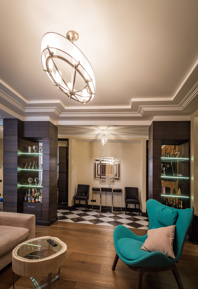 Idée de décoration pour un grand salon design avec une salle de réception, un sol en bois brun et un téléviseur fixé au mur.