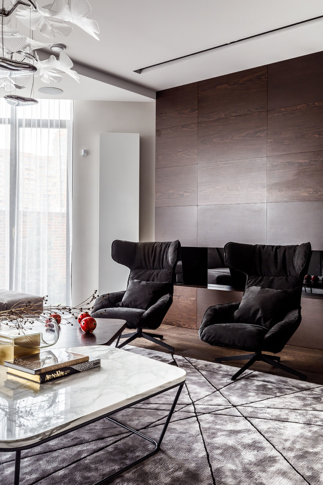 Esempio di un soggiorno design con pareti grigie, parquet scuro, camino lineare Ribbon e pavimento marrone