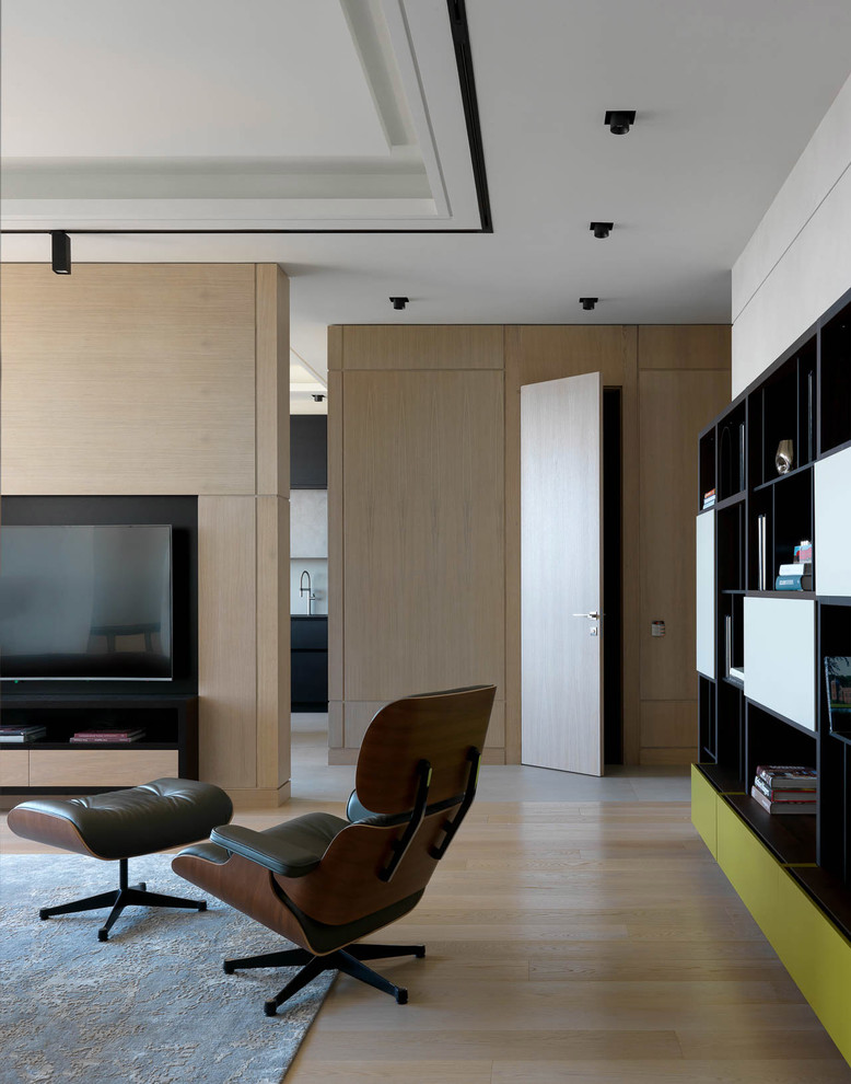 Idee per un soggiorno design di medie dimensioni con pavimento in legno massello medio