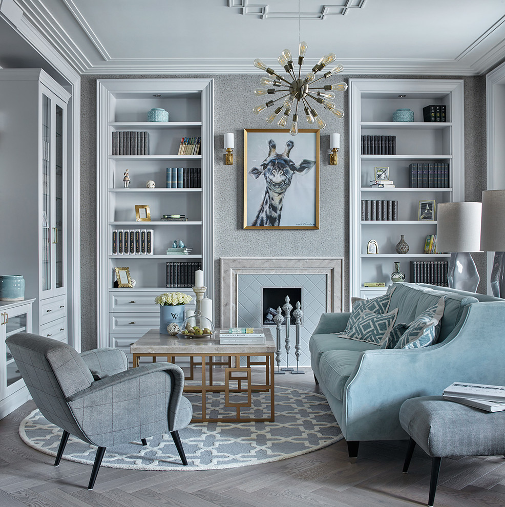 Inspiration for a medium sized traditional formal and grey and teal living room in Other with grey walls, a standard fireplace, a tiled fireplace surround, grey floors and feature lighting.