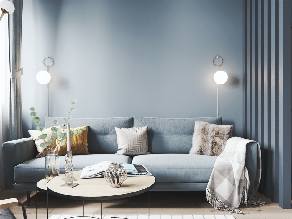Idee per un grande soggiorno nordico aperto con pareti blu, pavimento in laminato e pavimento beige