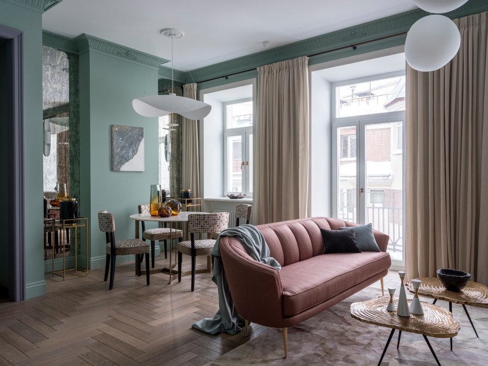 Contemporary grey and pink living room in Moscow with green walls and beige floors.