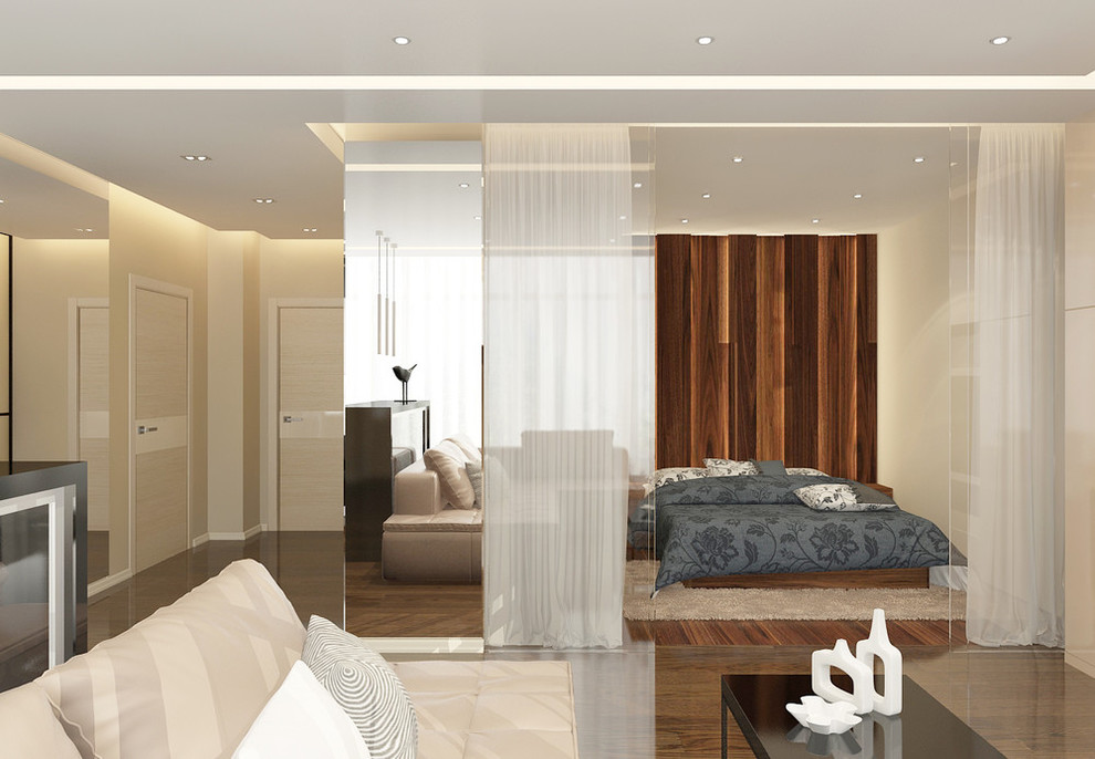 Esempio di un piccolo soggiorno minimalista aperto con sala formale, pareti beige e parete attrezzata