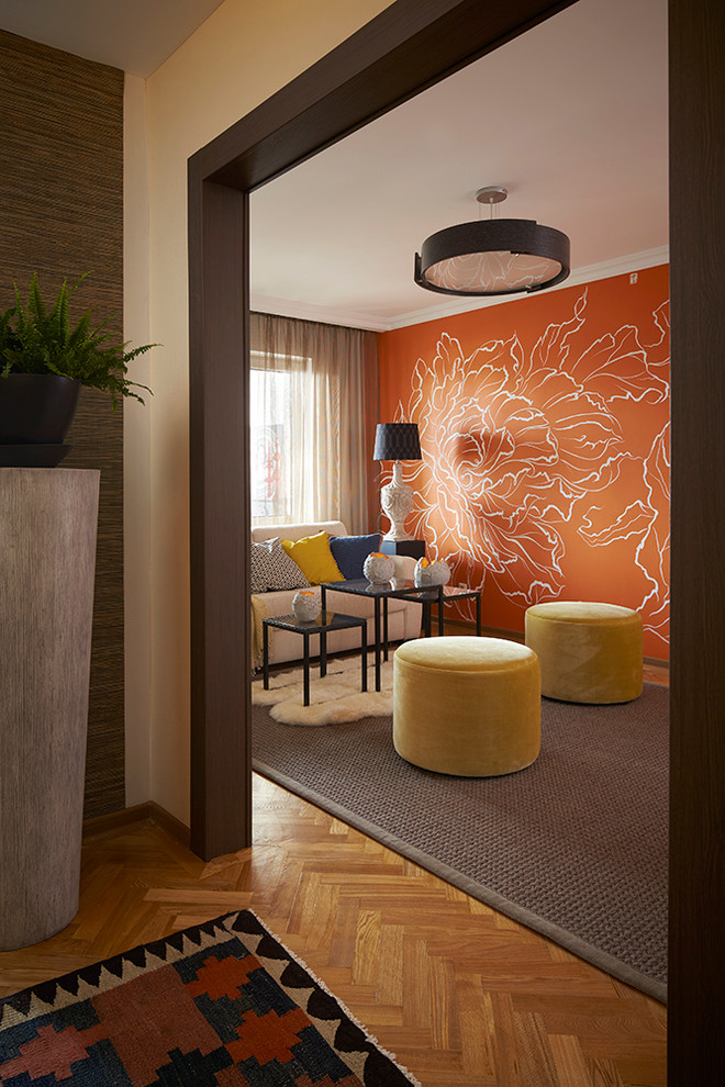 Idee per un soggiorno design chiuso con sala formale, pareti arancioni e moquette