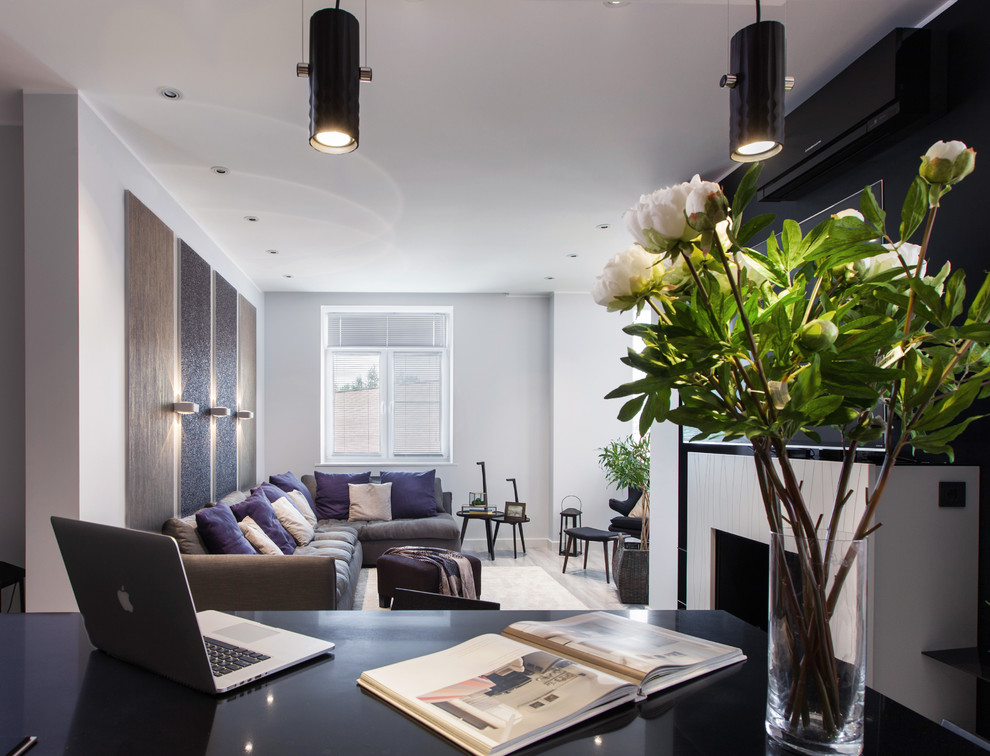 Стильный дизайн: гостиная комната среднего размера в современном стиле - последний тренд