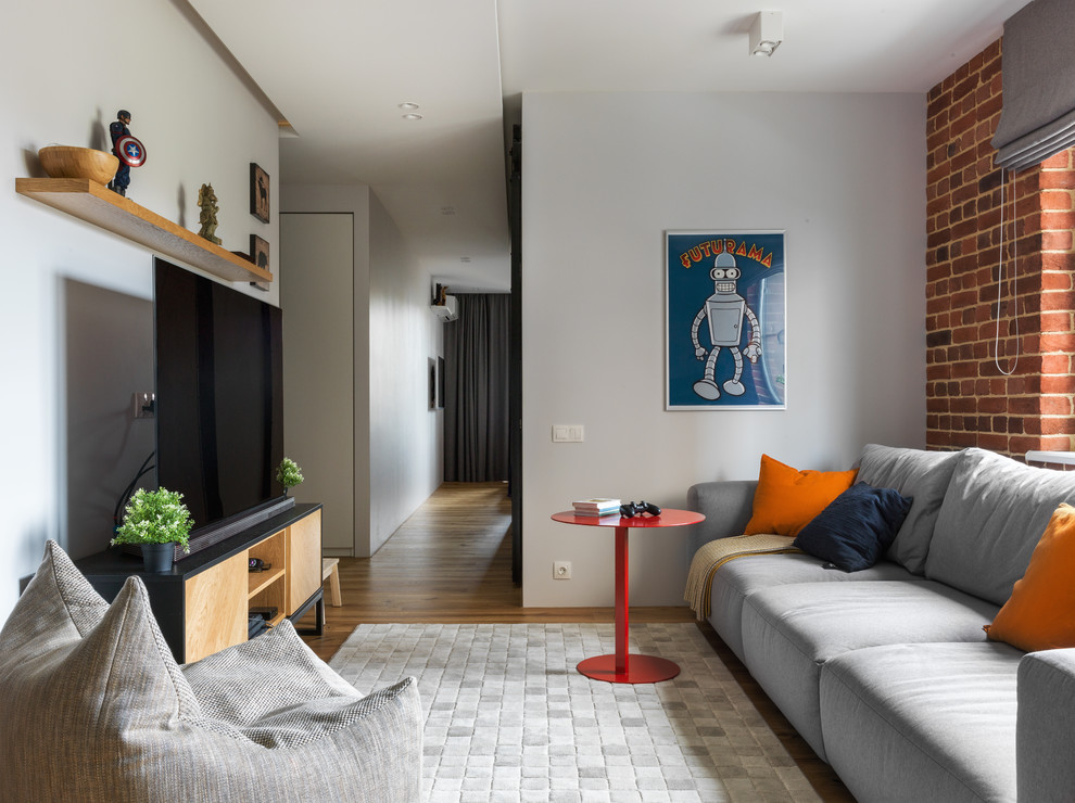Источник вдохновения для домашнего уюта: гостиная комната в стиле лофт с отдельно стоящим телевизором