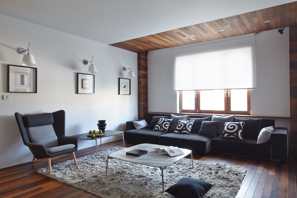 Example of a trendy formal and open concept dark wood floor and brown floor living room design in Moscow