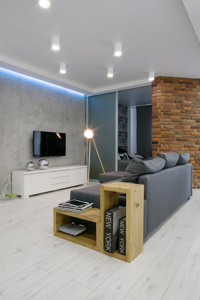 Идея дизайна: гостиная комната среднего размера в стиле лофт