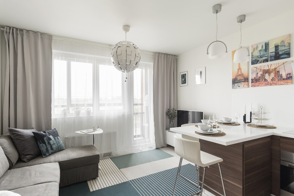 Diseño de sala de estar abierta nórdica de tamaño medio con paredes blancas, suelo de baldosas de porcelana y suelo gris