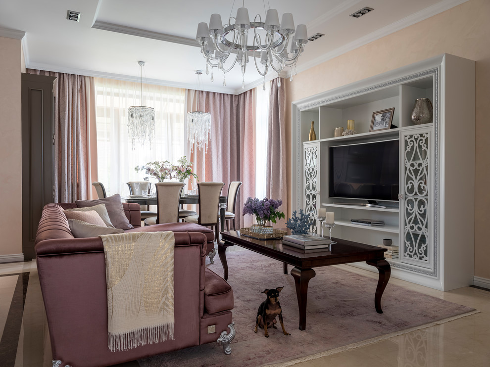 Classic living room in Moscow with beige walls, a freestanding tv and beige floors.