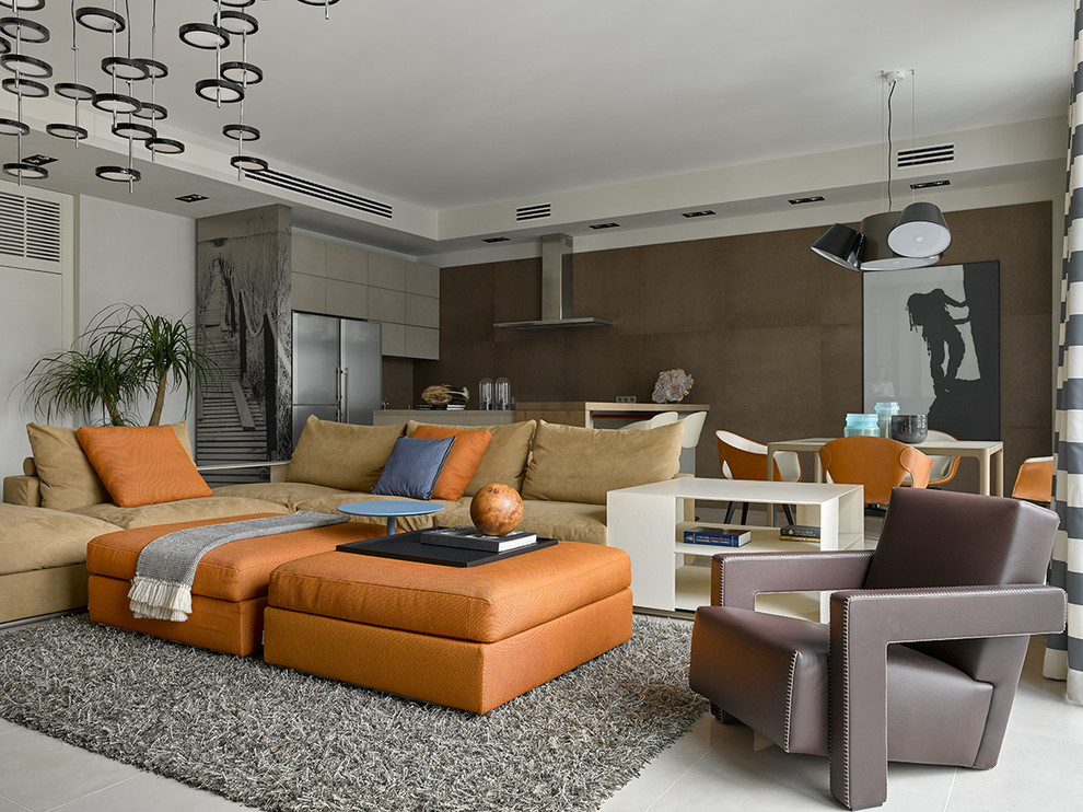 Example of a trendy open concept living room design in Moscow with brown walls