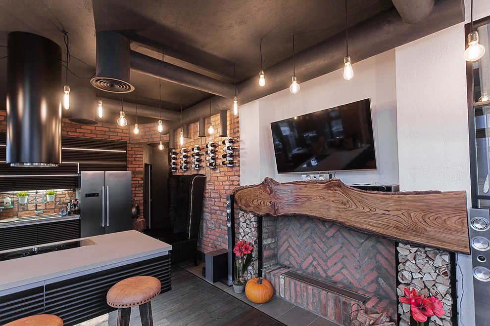 Свежая идея для дизайна: объединенная гостиная комната в стиле лофт с горизонтальным камином - отличное фото интерьера