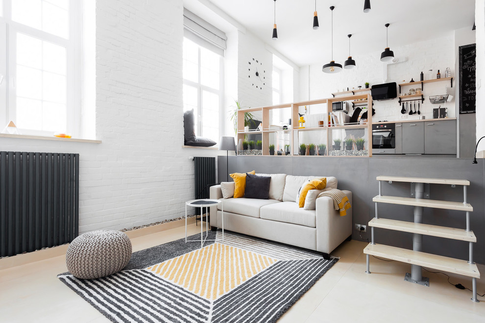 Mittelgroßes Modernes Wohnzimmer im Loft-Stil mit weißer Wandfarbe, Sperrholzboden und beigem Boden in Sonstige