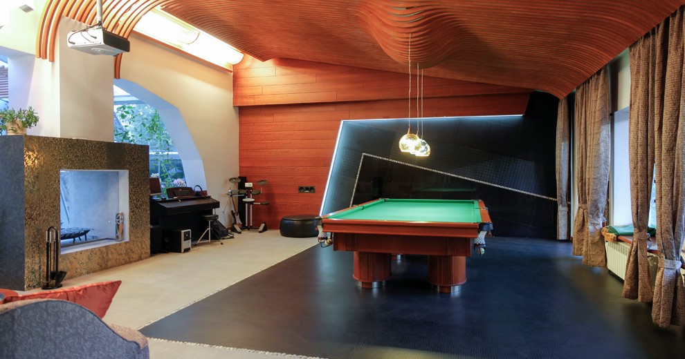 На фото: гостиная комната в современном стиле с бильярдным столом