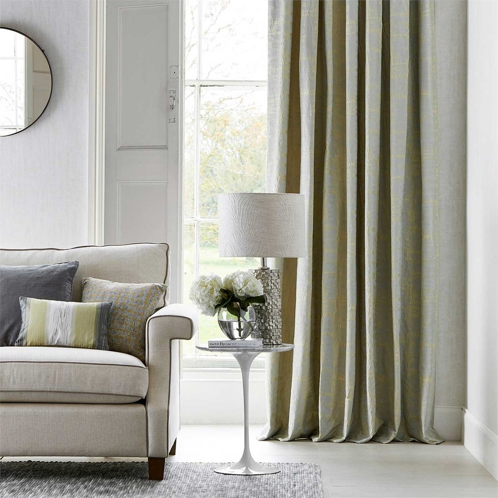 Foto di un soggiorno design con pareti bianche e pavimento bianco